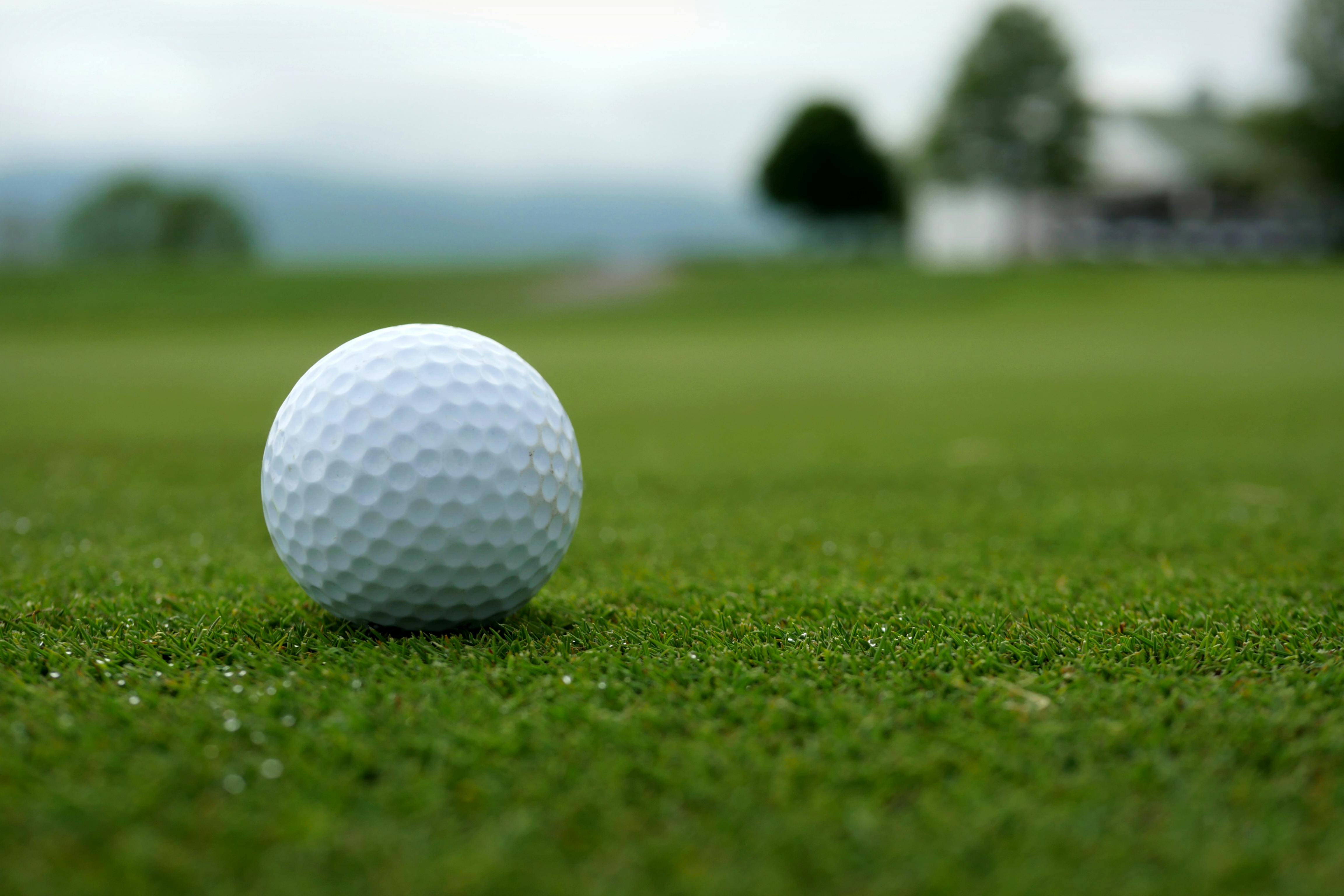 golf ball on golf course green
